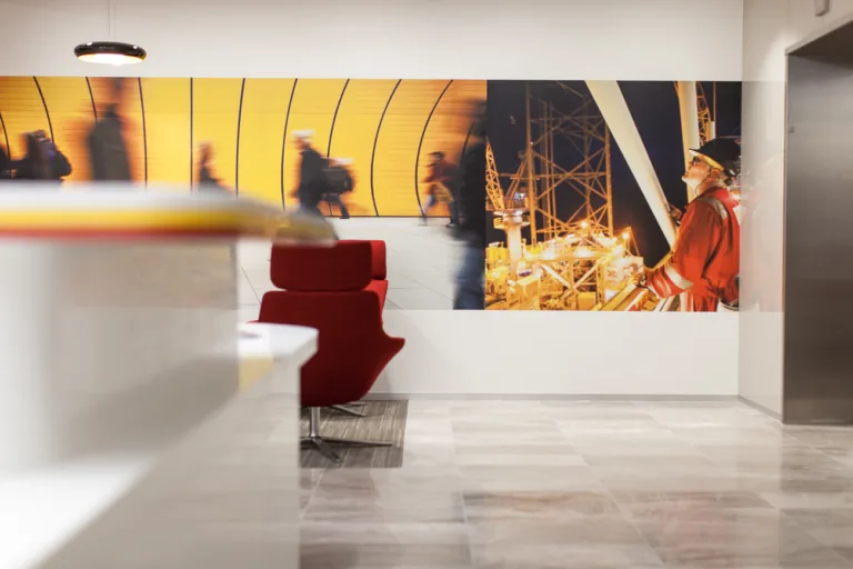 Digital Print wall graphic displaying vibrant colours of the businesses brand. yellow, red and construction workers, wall graphics perth, corporate signage, business signage, wall signage, signage design