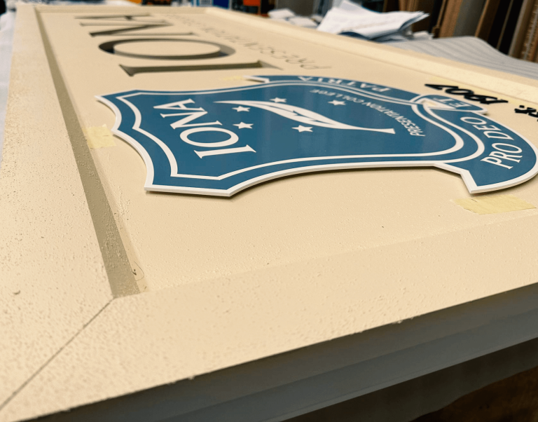 Custom Sign Fabrication using acrylic and metal elements